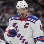 Mar 25, 2026; Toronto, Ontario, CAN; New York Rangers forward J.T. Miller (8) directs a teammate during break in the action against the Toronto Maple Leafs during the first period at Scotiabank Arena. Mandatory Credit: John E. Sokolowski-Imagn Images