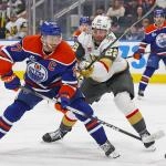 Apr 4, 2026; Edmonton, Alberta, CAN; Edmonton Oilers forward Connor McDavid (97) gets a shot away in front of Vegas Golden Knights forward Cole Schwindt (22) during the third period at Rogers Place. Mandatory Credit: Perry Nelson-Imagn Images