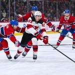 Apr 5, 2026; Montreal, Quebec, CAN; Montreal Canadiens defenseman Mike Matheson (8) defends against New Jersey Devils defenseman Luke Hughes (43) during the second period at Bell Centre. Mandatory Credit: David Kirouac-Imagn Images