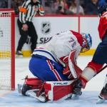 28 décembre 2024 ; Sunrise, Floride, États-Unis ; le gardien des Canadiens de Montréal, Jakub Dobes (75), effectue un arrêt face aux Panthers de la Floride durant la première période à l’Amerant Bank Arena.
