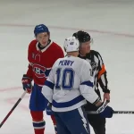 Corey Perry et Lane Hutson