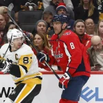 Oct 13, 2023; Washington, District of Columbia, USA; Pittsburgh Penguins center Sidney Crosby (87) and Washington Capitals left wing Alex Ovechkin (8) skate in the second period at Capital One Arena. Mandatory Credit: Geoff Burke-Imagn Images