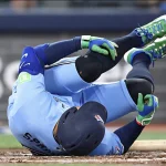 Apr 11, 2026; Toronto, Ontario, CAN; Toronto Blue Jays designated hitter George Springer (4) on the ground in pain against the Minnesota Twins at Rogers Centre.