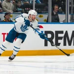 Jan 31, 2026; Vancouver, British Columbia, CAN; Toronto Maple Leafs defenseman Morgan Rielly (44) makes a pass against the Vancouver Canucks in the second period at Rogers Arena. Mandatory Credit: Bob Frid-Imagn Images