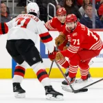 Apr 11, 2026; Detroit, Michigan, USA; Detroit Red Wings center Dylan Larkin (71) skates with the puck in the second period against the New Jersey Devils at Little Caesars Arena. Mandatory Credit: Rick Osentoski-Imagn Images