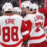 Mar 31, 2026; Pittsburgh, Pennsylvania, USA; Detroit Red Wings center Dylan Larkin (71) celebrates his power play goal with teammates against the Pittsburgh Penguins during the second period at PPG Paints Arena. Mandatory Credit: Charles LeClaire-Imagn Images