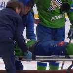 Chilling scene as Evgeny Kuznetsov is stretchered off after brutal hit