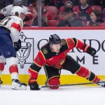 Apr 9, 2026; Ottawa, Ontario, CAN; Ottawa Senators left wing Brady Tkachuk (7) falls after battling with Florida Panthers center Jesper Boqvist (70) in the first period at the Canadian Tire Centre.