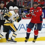 Apr 12, 2026; Washington, District of Columbia, USA; Washington Capitals left wing Alex Ovechkin (8) covers Pittsburgh Penguins center Sidney Crosby (87) in the final minute during the third period at Capital One Arena. Mandatory Credit: Geoff Burke-Imagn Images