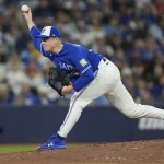 Apr 12, 2026; Toronto, Ontario, CAN; Toronto Blue Jays starting pitcher Louie Varland (77) pitches to the Minnesota Twins during the seventh inning at Rogers Centre.