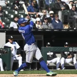 Apr 5, 2026; Chicago, Illinois, USA; Toronto Blue Jays right fielder George Springer (4) singles during the fifth inning against the Chicago White Sox at Rate Field.