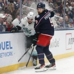 Mar 21, 2026; Columbus, Ohio, USA; Columbus Blue Jackets defenseman Ivan Provorov (9) and Seattle Kraken right wing Jacob Melanson (63) during the third period at Nationwide Arena.