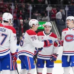 Apr 12, 2026; Elmont, New York, USA; Montreal Canadiens right wing Zachary Bolduc (76) celebrates a third period goal with center Kirby Dach (77), defenseman Lane Hutson (48) and defenseman Arber Xhekaj (72) at UBS Arena.