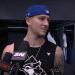 Jeff Hoffman speaks to the media in a postgame interview