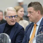 Apr 24, 2025; Toronto, Ontario, Canada; President and CEO of Maple Leaf Sport  Entertainment Keith Pelley (left) talks with Hamilton Sports Group President and Chief Operating Officer Matt Afinec (right) during a press conference at Hotel X. Mandatory Credit: John E. Sokolowski-Imagn Images