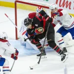 11 mars 2026; Ottawa (Ontario, Canada); Claude Giroux (28), ailier droit des Sénateurs d\'Ottawa, patine avec la rondelle devant le gardien des Canadiens de Montréal, Jacob Fowler (32), en troisième période au Centre Canadian Tire.