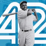 MLB Legend Jackie Robinson swinging his bat in front of his iconic #42.