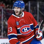 26 février 2026 ; Montréal, Québec, Canada ; Le défenseur des Canadiens de Montréal, Noah Dobson (53), exprime sa joie après avoir marqué son deuxième but de la rencontre contre les Islanders de New York au cours de la deuxième période au Centre Bell.