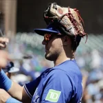 Jul 7, 2024; Seattle, Washington, USA; Toronto Blue Jays left fielder Daulton Varsho signs autographs pregame at T-Mobile Park. Mandatory Credit: John Froschauer-Imagn Images
