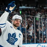 Jan 31, 2026; Vancouver, British Columbia, CAN; Toronto Maple Leafs forward Auston Matthews (34) celebrates his game winning shootout goal against the Vancouver Canucks at Rogers Arena. Mandatory Credit: Bob Frid-Imagn Images