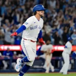 Mar 28, 2026; Toronto, Ontario, CAN; Toronto Blue Jays third baseman Ernie Clement (22) celebrates hitting a walk off single against the Athletics during the eleventh inning at Rogers Centre. Mandatory Credit: Kevin Sousa-Imagn Images