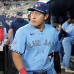 Apr 1, 2026; Toronto, Ontario, CAN; Toronto Blue Jays third baseman Kazuma Okamoto (7) in the dugout before a game against the Colorado Rockies at Rogers Centre. Mandatory Credit: Apr 1, 2026; Toronto, Ontario, CAN; Toronto Blue Jays third baseman Kazuma Okamoto (7) in the dugout before a game against the Colorado Rockies at Rogers Centre. Mandatory Credit: John E. Sokolowski-Imagn Images