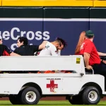Sep 1, 2025; Phoenix, Arizona, USA; Arizona Diamondbacks outfielder Lourdes Gurriel Jr. (12) is taken off by cart in the sixth inning during the game between the Texas Rangers and Arizona Diamondbacks at Chase Field. Mandatory Credit: Arianna Grainey-Imagn Images