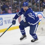 Mar 25, 2026; Toronto, Ontario, CAN; Toronto Maple Leafs forward Matthew Knies (23) skates against the New York Rangers during the first period at Scotiabank Arena. Mandatory Credit: John E. Sokolowski-Imagn Images