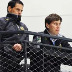 Boston Bruins GM Don Sweeney alongside assistant GM Evan Gold