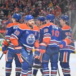 Mar 15, 2026; Edmonton, Alberta, CAN; Edmonton Oilers center Leon Draisaitl (29), left wing Zach Hyman (18) and Oilers center Ryan Nugent-Hopkins (93) celebrate a goal on Nashville Predators goalie Justus Annunen (29) during the first period at Rogers Place.