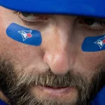 May 25, 2018; Philadelphia, PA, USA; Toronto Blue Jays center fielder Kevin Pillar (11) looks on from the dugout prior to the game against the Philadelphia Phillies at Citizens Bank Park. Mandatory Credit: Bill Streicher-Imagn Images