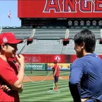 April 20. 2026: Toronto Blue Jays third baseman Kazuma Okamoto catching up with his old buddy Yusei Kikuchi ahead of the clubs matchup with the Los Angeles Angels on Monday.