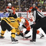 Apr 20, 2026; Pittsburgh, Pennsylvania, USA; Pittsburgh Penguins center Ben Kindel (81) and Philadelphia Flyers left wing Noah Cates (27) take a first period face-off in game two of the first round of the 2026 Stanley Cup Playoffs at PPG Paints Arena.