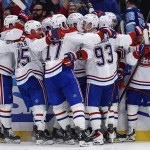 19 avril 2026 ; Tampa, Floride, �tats-Unis ; Lattaquant des Canadiens de Montr�al Juraj Slafkovsky (20) et ses co�quipiers c�l�brent le but d�cisif marqu� contre le Lightning de Tampa Bay lors de la prolongation du premier match du premier tour des s�ries �liminatoires de la Coupe Stanley 2026, � la Benchmark International Arena