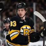 Jan 13, 2026; Boston, Massachusetts, USA; Boston Bruins center Fraser Minten (93) after a whistle during the first period against the Detroit Red Wings at TD Garden