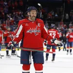 Nov 5, 2025; Washington, District of Columbia, USA; Washington Capitals left wing Alex Ovechkin (8) gestures to his son Sergei (not pictured) after the Capitals\' game against the St. Louis Blues, where he scored his 900th NHL goal at Capital One Arena.