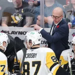 Nov 1, 2025; Winnipeg, Manitoba, CAN; Pittsburgh Penguins head coach Dan Muse instructs players during a time out against the Winnipeg Jets in the third period at Canada Life Centre. Mandatory Credit: James Carey Lauder-Imagn Images