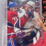Apr 9, 2026; Montreal, Quebec, CAN; Montreal Canadiens defenseman Arber Xhekaj (72) checks Tampa Bay Lightning forward Corey Perry (10) during the third period at the Bell Centre.