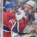 9 avril 2026 ; Montréal, Québec, Canada ; Le défenseur des Canadiens de Montréal, Arber Xhekaj (72), plaque l\'attaquant du Lightning de Tampa Bay, Corey Perry (10), au cours de la troisième période au Centre Bell