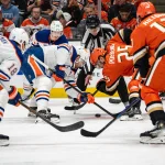 Apr 26, 2026; Anaheim, California, USA; Anaheim Ducks center Ryan Poehling (25) in a face off during the first period against the Edmonton Oilers in game four of the first round of the 2026 Stanley Cup Playoffs at Honda Center. Mandatory Credit: Corinne Votaw-Imagn Images