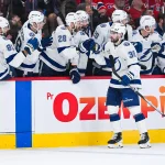 Apr 26, 2026; Montreal, Quebec, CAN; Tampa Bay Lightning left wing Brandon Hagel (38) celebrates his second goal of the game against the Montreal Canadiens with his teammates at the bench during the third period in game four of the first round of the 2026 Stanley Cup Playoffs at Bell Centre. Mandatory Credit: David Kirouac-Imagn Images