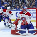 29 avril 2026 ; Tampa, Floride, États-Unis ; Le gardien des Canadiens de Montréal, Jakub Dobes (75), bloque un tir face au Lightning de Tampa Bay au cours de la première période du cinquième match du premier tour des séries éliminatoires de la Coupe Stanley 2026, à la Benchmark International Arena.
