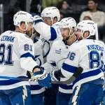 Mar 17, 2026; Seattle, Washington, USA; Tampa Bay Lightning defenseman Erik Cernak (81), defenseman Victor Hedman (77), middle, forward Anthony Cirelli (71), second from right, and forward Nikita Kucherov (86) celebrate a goal during the third period at Climate Pledge Arena.