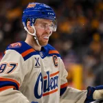 Jan 13, 2026; Nashville, Tennessee, USA; Edmonton Oilers center Connor McDavid (97) awaits the face off against the Nashville Predators during the second period at Bridgestone Arena.
