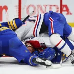 May 8, 2026; Buffalo, New York, USA; Buffalo Sabres and Montréal Canadiens players get into a scrum after the whistle during the second period in game two of the second round of the 2026 Stanley Cup Playoffs at KeyBank Center.