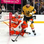 Multiple injuries hit Anaheim Ducks and Vegas Golden Knights ahead of game 4 May 4, 2026; Las Vegas, Nevada, USA; Anaheim Ducks defenseman Drew Helleson (14) falls after clearing the puck away from Vegas Golden Knights right wing Mark Stone (61) during the third period of game one of the second round of the 2026 Stanley Cup Playoffs at T-Mobile Arena.