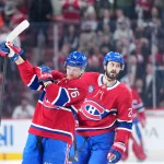 Jan 27, 2026; Montreal, Quebec, CAN; Montreal Canadiens forward Philip Danault (24) celebrates with teammate forward Zack Bolduc (76) after scoring a goal against the Vegas Golden Knights during the second period at the Bell Centre. Mandatory Credit: Eric Bolte-Imagn Images