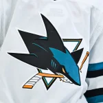 Mar 14, 2026; Montreal, Quebec, CAN; View of a San Jose Sharks logo on a jersey worn by a member of the team during the third period at Bell Centre.