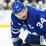 Oct 12, 2024; Toronto, Ontario, CAN; Toronto Maple Leafs center Auston Matthews (34) gets ready for the faceoff against the Pittsburgh Penguins during the first period at Scotiabank Arena. Mandatory Credit: Nick Turchiaro-Imagn Images