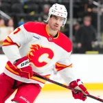 Apr 2, 2026; Las Vegas, Nevada, USA; Calgary Flames defenseman Kevin Bahl (7) warms up before a game against the Vegas Golden Knights at T-Mobile Arena. Mandatory Credit: Stephen R. Sylvanie-Imagn Images